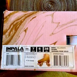 Rose gold impala roller skates